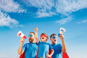 Poster - Grandfather, father and son having fun outdoor. Fathers day