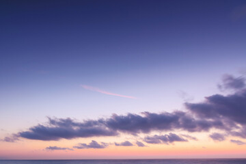Wall Mural - clouds on the sky at twilight. beautiful nature background in colorful light at dawn