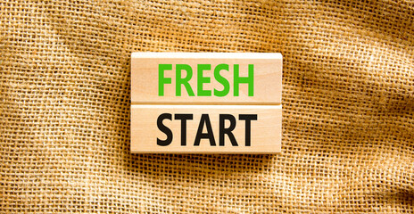 Wall Mural - Fresh start and motivational symbol. Concept words Fresh start on beautiful wooden block. Beautiful canvas table canvas background. Business motivational and Fresh start concept. Copy space.