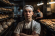 © wetzkaz - baker in uniform at the manufacturing small business owner concept. Generative AI