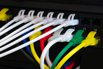 Poster - Multi Colored Network Cables Connected to Switch, network  technology concept