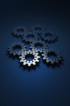 Close-up of metal gears on a blue background. 3d rendering illustration.