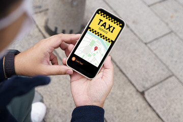 Man in downtown city street ordering taxi using smart phone app Booking taxi using application online on smart phone