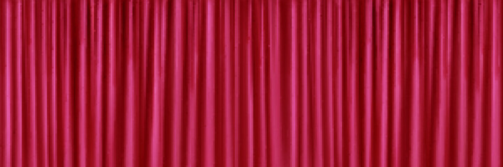 Viva magenta color silk fabric texture background. Luxury satin drapery material pattern realistic red 3d wallpaper. Modern beautiful textile glossy material with crease horizontal illustration