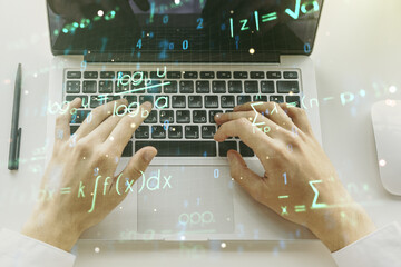 Poster - Double exposure of creative scientific formula concept with hands typing on laptop on background, research and development concept