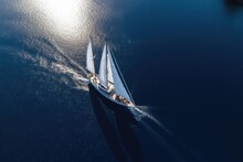 Aerial View Of A Big Sailboat On The Tropical Sea Near The Island. Copy Space