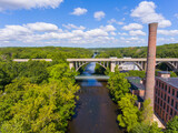 Ashton Mill and George Washington Bridge aerial view at Blackstone River between town of Cumberland and Lincoln, Rhode Island RI, USA. 