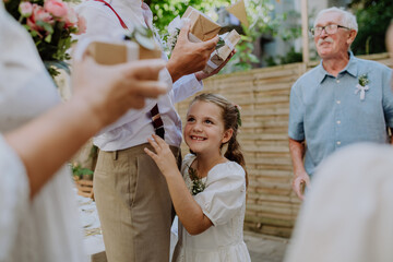 Multigenerational family at the outdoor wedding party.