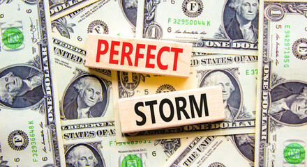Perfect storm symbol. Concept words Perfect storm on beautiful wooden block. Beautiful background from dollar bills. Business and Perfect storm concept. Copy space.