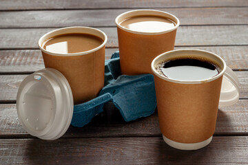 Many paper cups with coffee. Coffee to go background