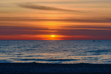 Wall Mural - Spectacular bright golden sunset over Baltic sea