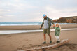 Family father walking with child on the beach summer vacations lifestyle travel together parent dad with daughter outdoor Fathers day holiday