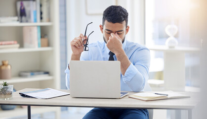 Poster - Perhaps its time for a change. a young businessman experiencing a headache at work.