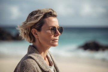 Photography in the style of pensive portraiture of a pleased woman in her 40s wearing a chic cardigan against an island or beach paradise background. Generative AI