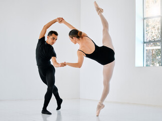 Sticker - Preparation is a step by steo process. Full length shot of two young ballet students rehearsing in their dance studio.