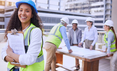 Aufkleber - Everything is up to code. Cropped portrait of an attractive young female construction worker standing outside with her team in the background.