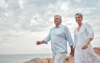 Poster - Love as hard as you live. a mature couple enjoying a romantic day along the coast.