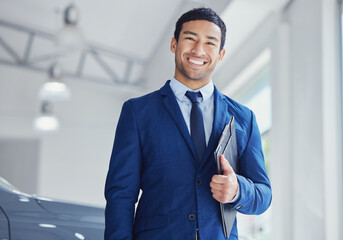 Poster - Ill get you your dream car. Cropped portrait of a handsome young male car salesman working on the showroom floor.
