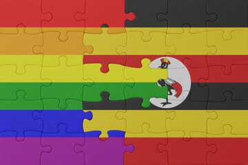 Wall Mural - puzzle with the flag of rainbow gay pride and uganda . macro.concept.