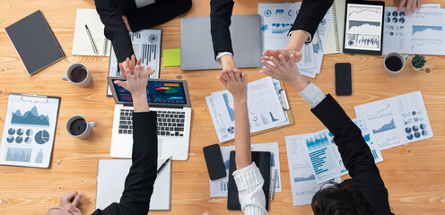 Poster - Top-view closeup business team of financial data analysis meeting with business intelligence, report paper and dashboard on laptop. Business group people working together in harmony office.