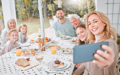 Canvas Print - Everyone needs a house to live in. a family taking a selfie while having lunch at home.