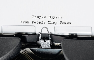 Poster - Text People Buy From People They Trust typed on retro typewriter