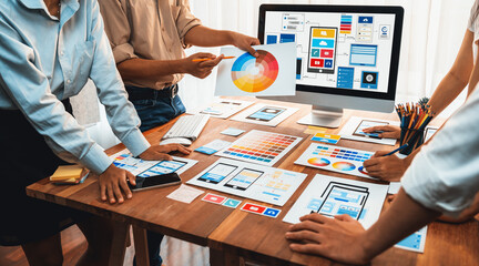 Aufkleber - Panorama shot of front-end developer team brainstorming UI and UX designs for mobile app on laptop computer screen. User interface development team planning for user-friendly UI design. Scrutinize