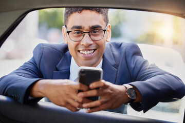 Poster - Ill take you wherever you need to go. Cropped portrait of a handsome young businessman looking through a car window while standing outside.