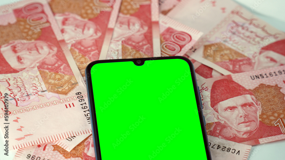 Green screen cell mobile phone with multiple one hundred 100 Rupees ...