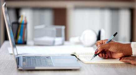 Poster - Set goals, smash them. an unrecognisable woman making notes in a book while studying at home.