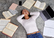 © Daiyaan Philander/peopleimages.com - Its all too much. High angle shot of an unrecognizable young female student looking stressed while studying in the library.