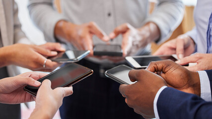 Poster - Like and share our page. a group of unrecognizable businesspeople using their cellphones.