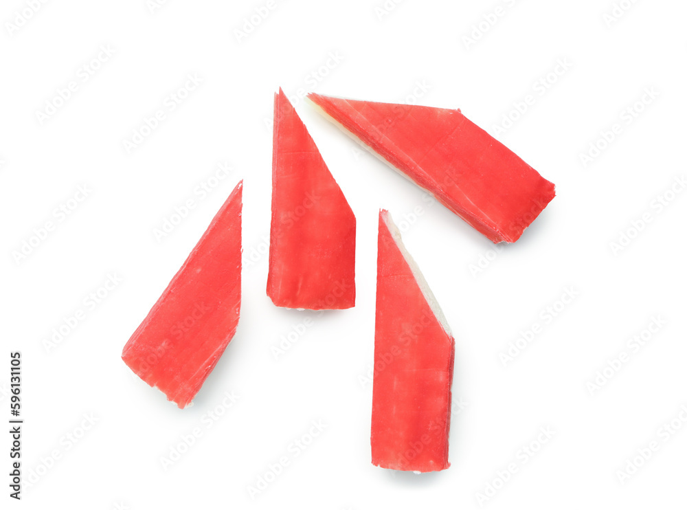 Tasty cut crab sticks isolated on white background