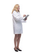 friendly female doctor with clipboard looking at white screen.