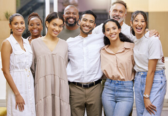 Poster - Winning, collectively. Portrait of a group of businesspeople casually posing for a photo in a modern office.