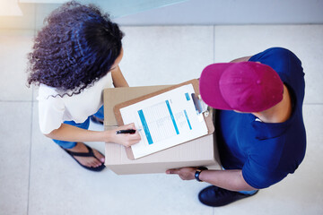 Poster - Its all yours once you sign for it. High angle shot of a customer signing for her delivery from the courier.