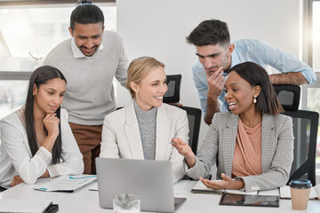 Canvas Print - Cooperation is the thorough conviction. a group of colleagues having a discussion in a office.