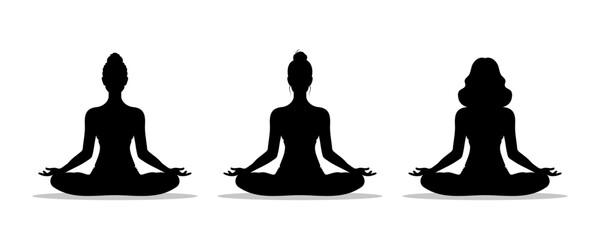 Wall Mural - Silhouette of a woman meditating sitting in a lotus position