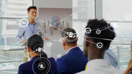 Poster - Animation of network of digital icons over asian businessman standing on a podium at a conference