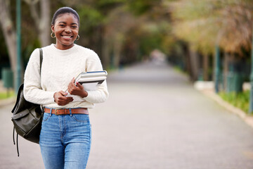 Sticker - My future is calling and I must go. a young woman carrying her schoolbooks outside at college.