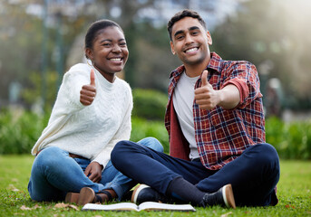 Canvas Print - The best study buddy any student could have. a young man and woman showing thumbs up on a study break at college.