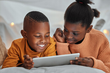 Wall Mural - This episode is the best. a brother and sister using a digital tablet together at home.