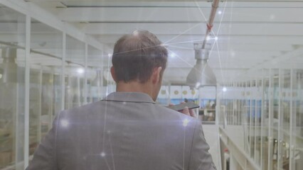 Poster - Animation of network of connections over caucasian businessman with smartphone