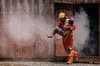 © Digital Art Studio - The firefighter bravely carried a child out of a smoke filled and dangerous place.