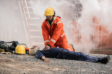 Wall Mural - With precision and skill the firefighters worked to pump the victim's heart and restore their breathing, Saving people.