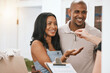 © Wesley JvR/peopleimages.com - Happy couple, real estate and property with keys from realtor or homeowner for buying, mortgage loan or investment. Man and woman with smile for key to house, moving or sale in new home and paperwork