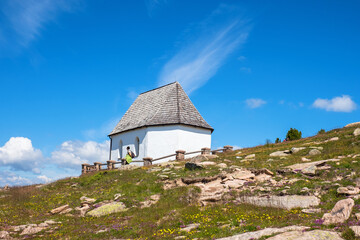 Canvas Print - Chapel on the mountain in the Alps