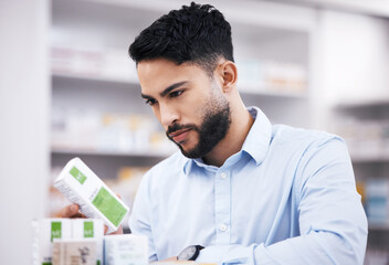 Pharmacy stock, man and medicine retail check of a customer in a healthcare and wellness store. Medical, inventory and pills label information checking and reading of a male person by a shop shelf