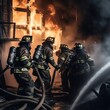 A team of firefighters battling a raging blaze