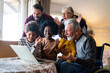 © NDABCREATIVITY - Portrait of a happy multigenerational multiethnic family at home.